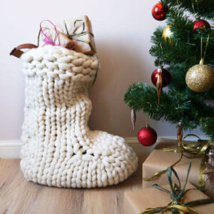 Large knitted stocking by Christmas Tree